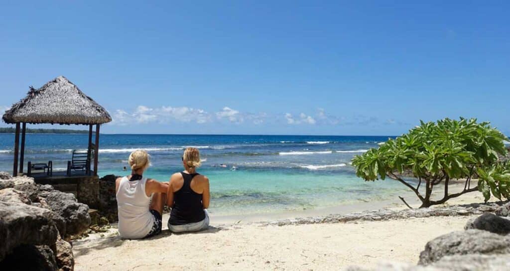 Rachel Davey and Marty Sebova of Very Hungry Nomads admiring the view from the beach