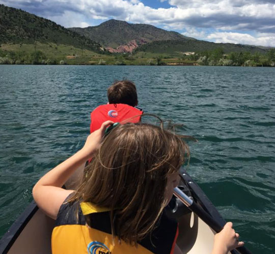 The author's kids boating in Bear Creek Lake Park