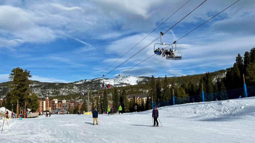 View of skiers and a ski lift at the Beaver Run Resort