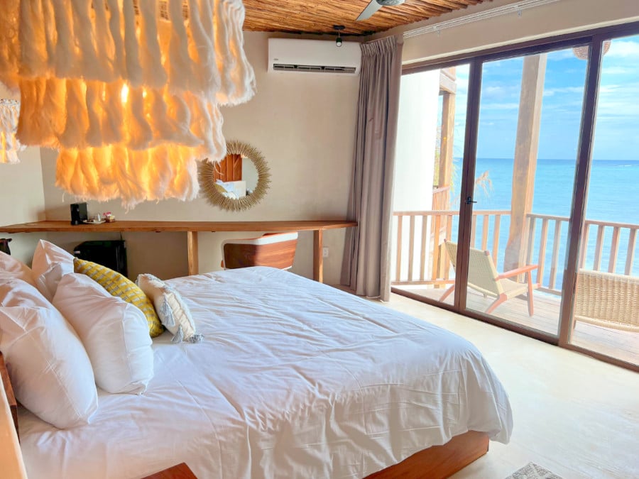 View of a bed at the Nerea Tulum hotel