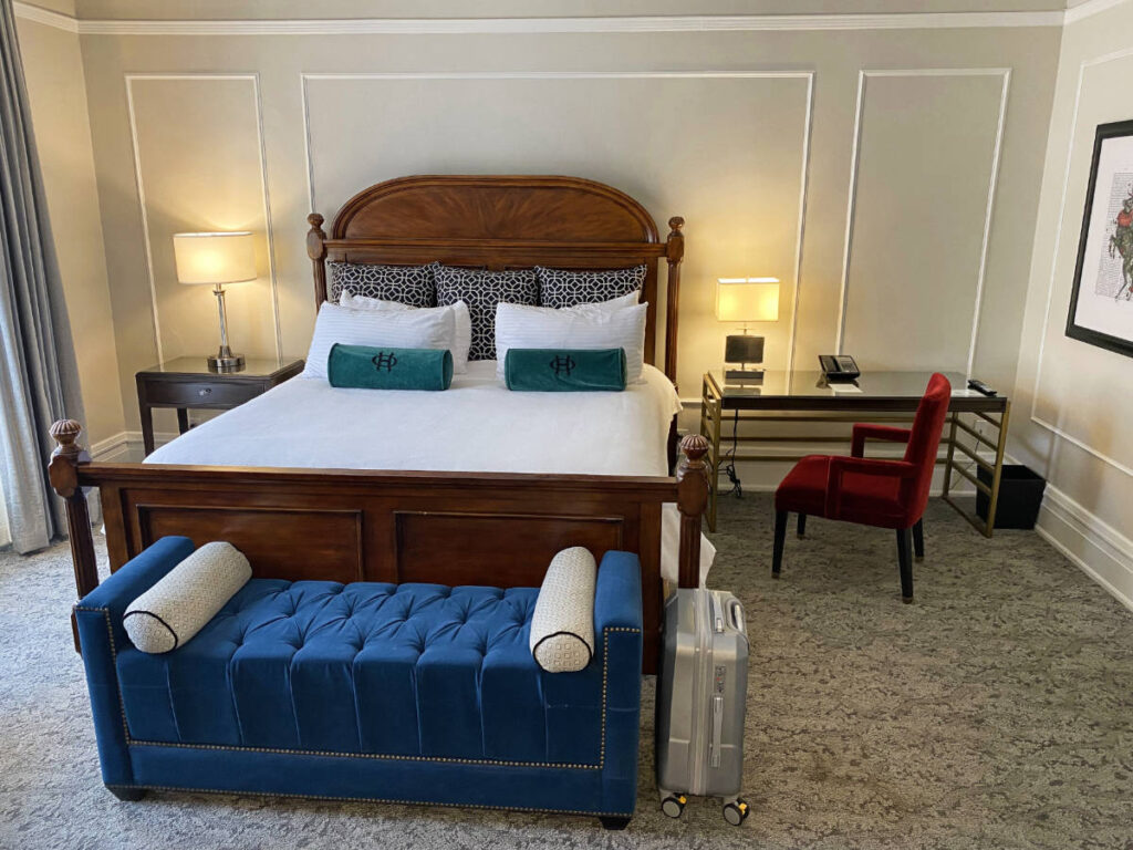 View of the bed inside one of the rooms in The Oxford Denver Hotel