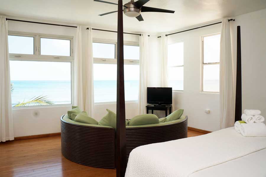 View of a bedroom with beach view in Bravo Beach Hotel