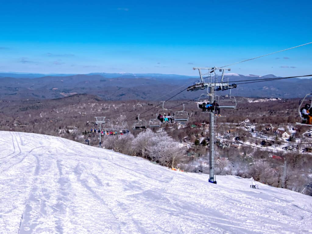 Clear blue sky over the ski lift in Beech Mountain during winter season