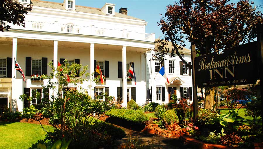The Beekman Arms Inn from the outside and its sign