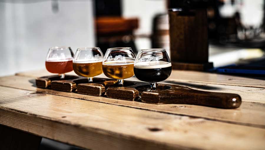 A beer flight on a table in Telluride Brewing Company