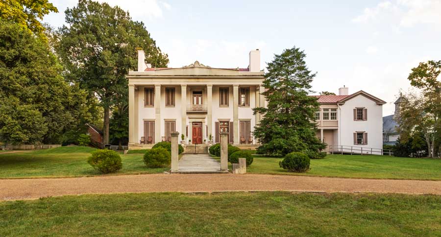 The Belle Meade Plantation surrounded with trees in Nashville