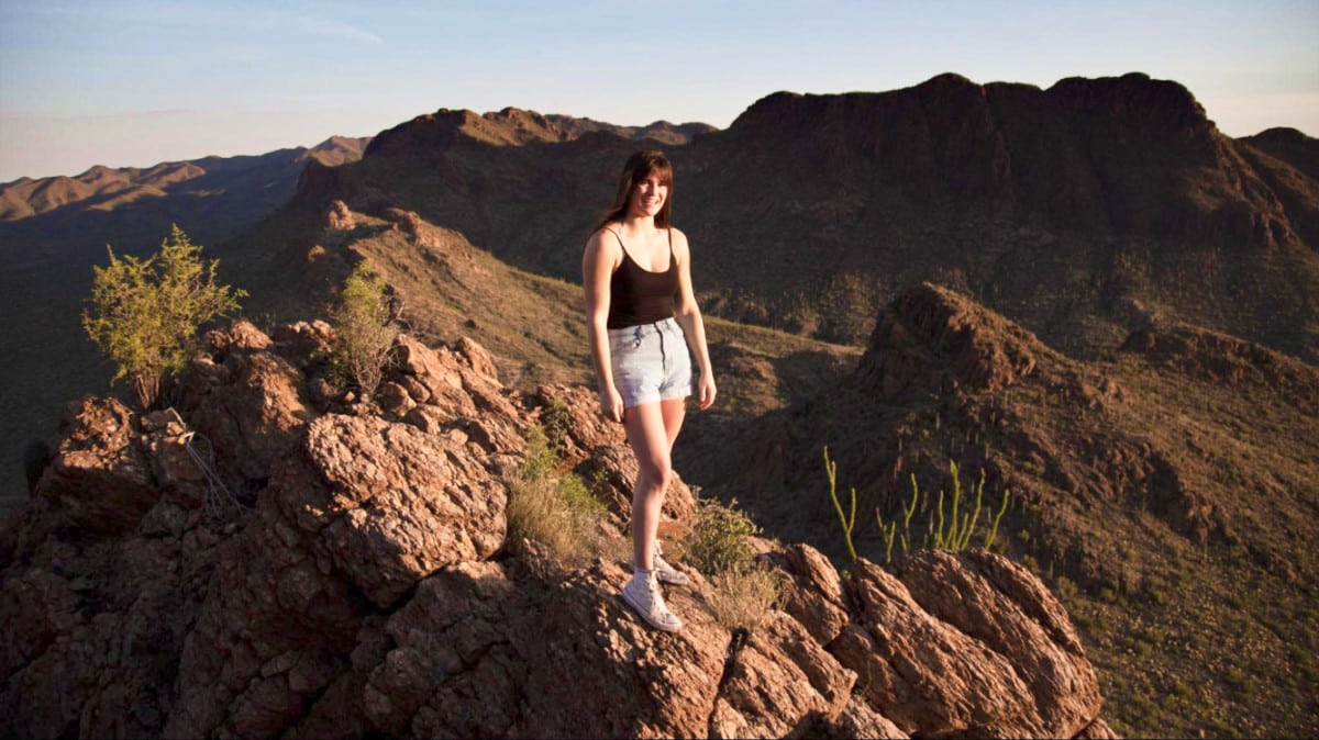 The author Betty Hurd, posing at the peak of one of the best hikes near Tucson.