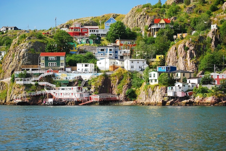 Quaint seaside houses dot the landscape of coastal Newfoundland and Labrador