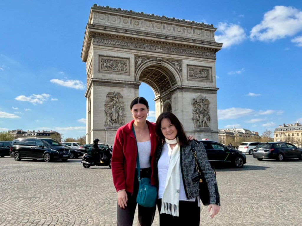 Author Rachel Kapelke-Dale and Betty Hurd in front of the Arc de Triomphe