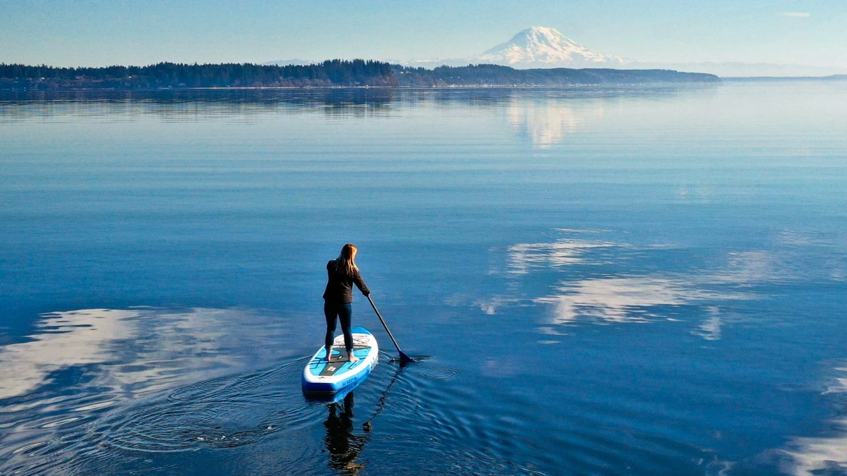 Travel Lemming Writer, Betty paddling in the Puget Sound