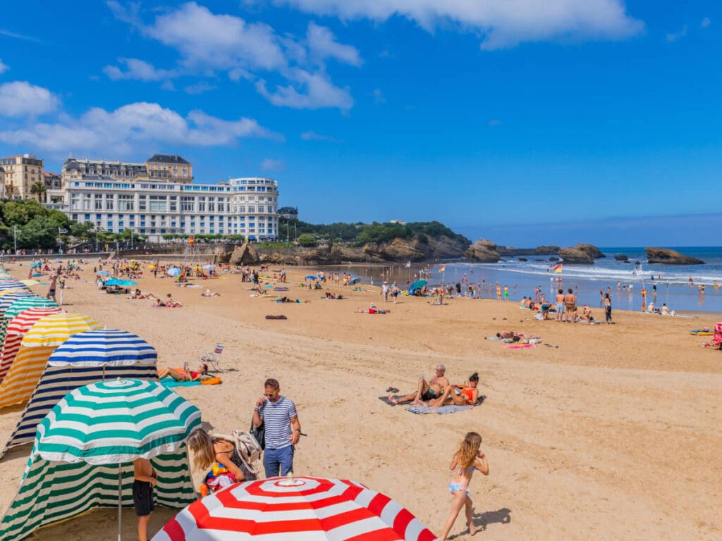 People enjoying their day on a beach in Biarritz