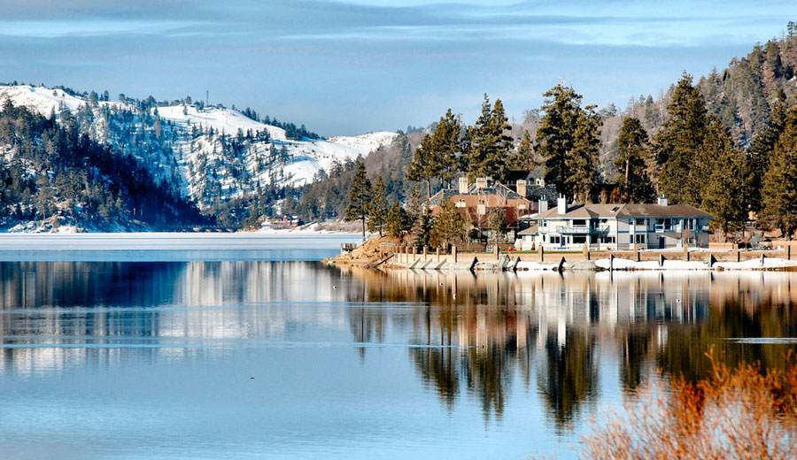 The reflection of the mountain and trees on the Big Bear Lake