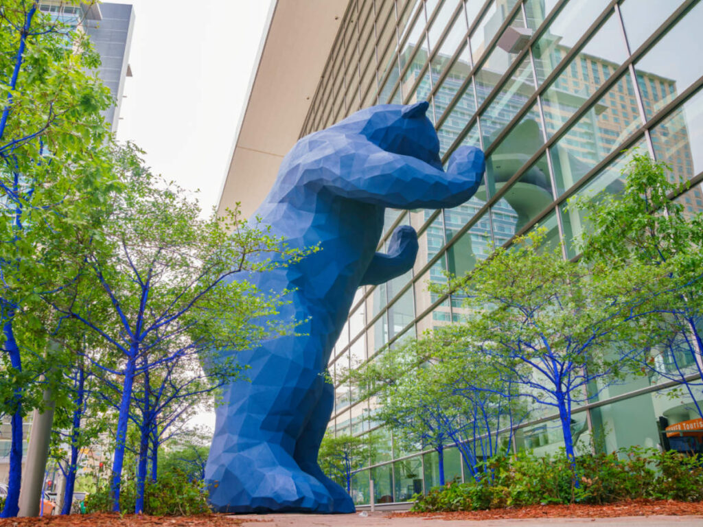 A blue bear statue stands proudly in Colorado Convention Center