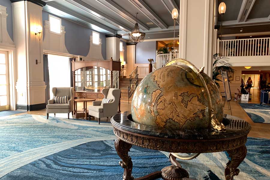 A big globe inside the lobby of Disney’s Yacht and Beach Club Resorts