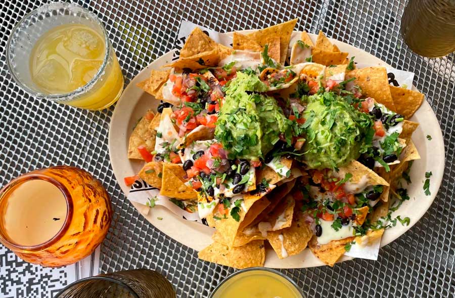 Nachos filled with toppings from Big Star