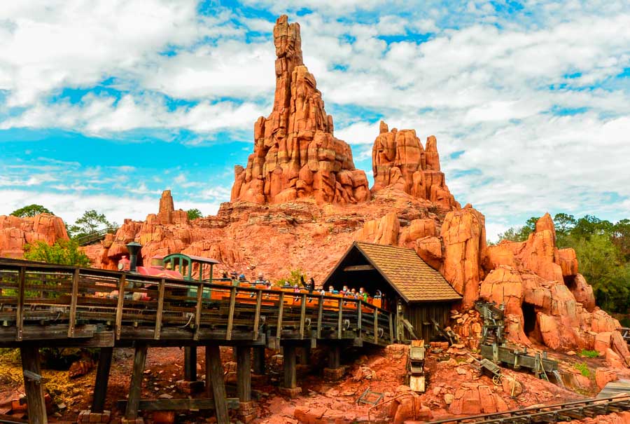 View of people enjoying their ride in Big Thunder Mountain Railroad