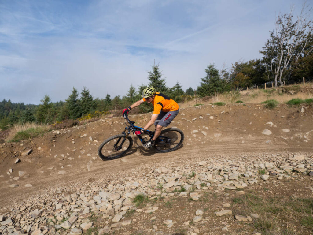 A mountain biker enjoying his ride in BikePark Wales