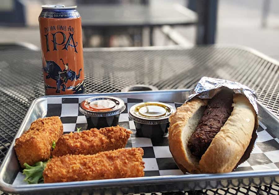 A balanced meal on a tray from Biker Jim’s Gourmet Dogs