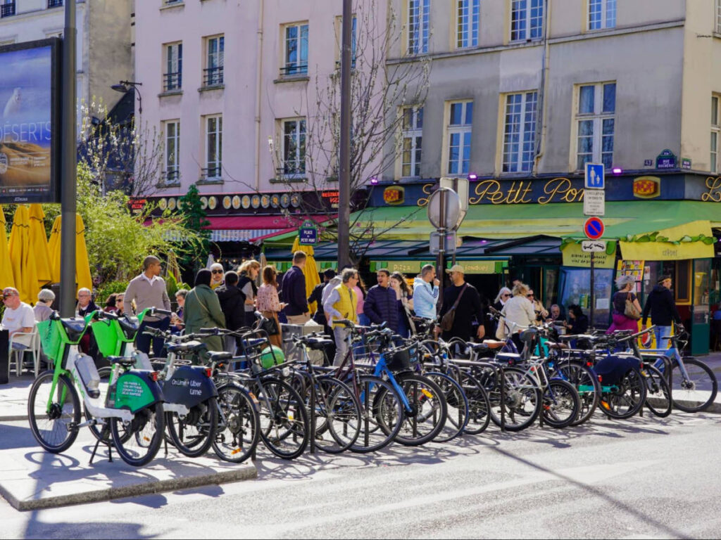 Bikes parked on a busy street in the 5th Arrondissement of Paris