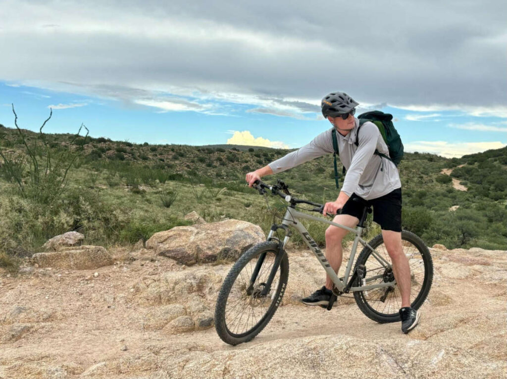 The author's brother mountain biking near Redington Pass