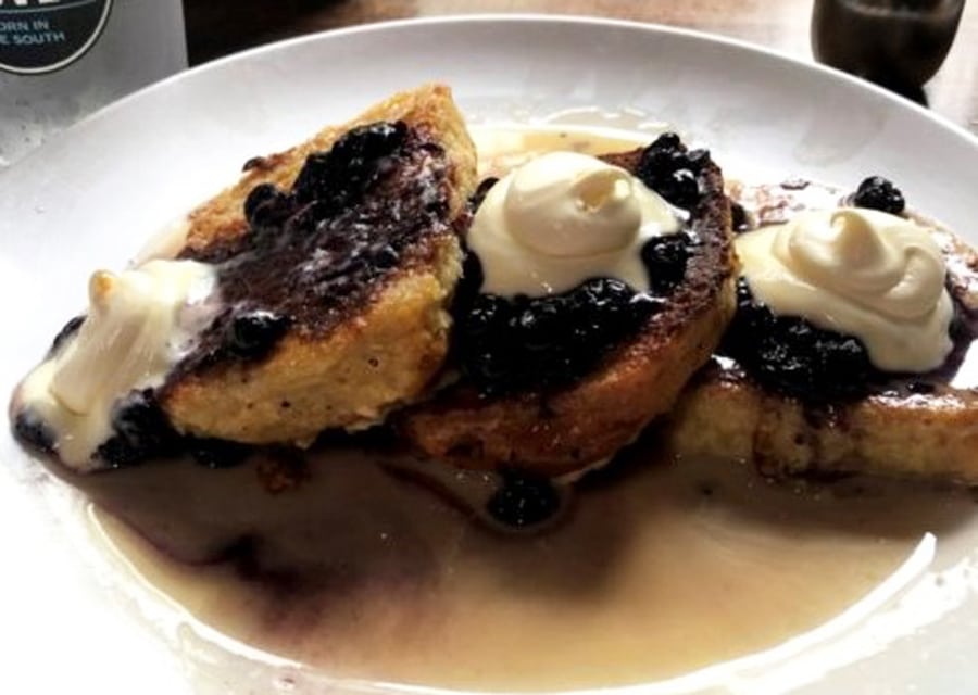 Blueberry bonuts on a plate at Biscuit Love