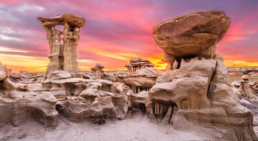 Colorful sky over the Bisti Badlands during sunset