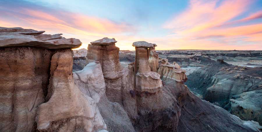 Colorful sky over the Bisti Badlands/De-Na-Zin Wilderness Area