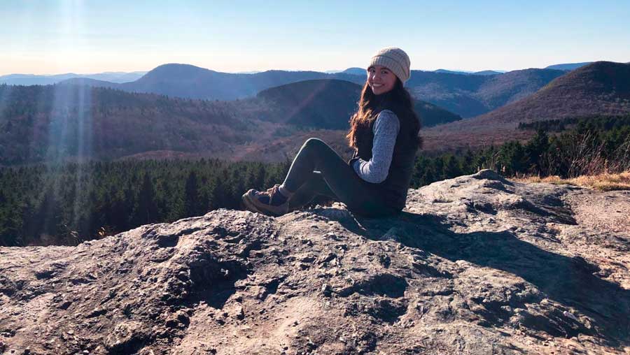 The author sitting at the top of Black Balsam with an overlooking view