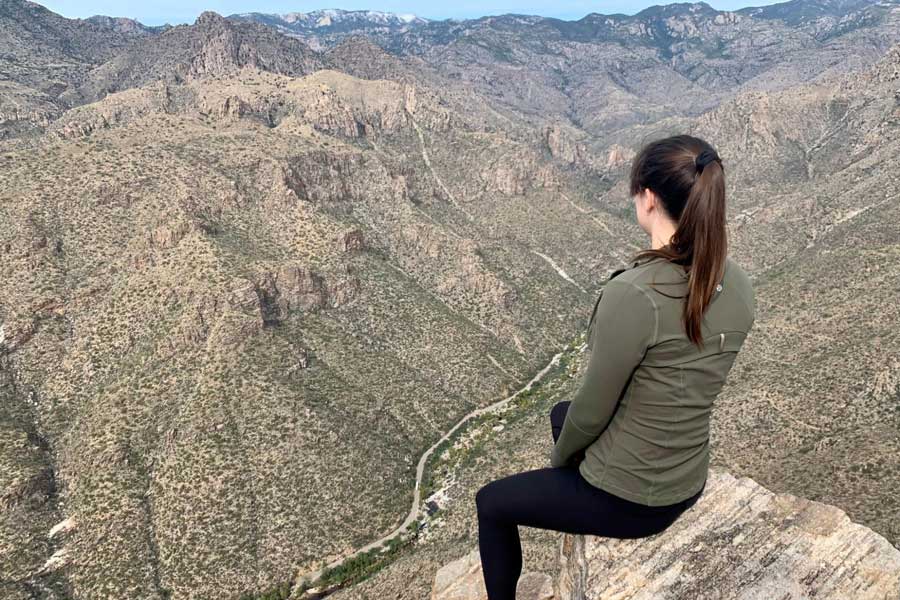 The author with the overlooking view from Blackett’s Ridge Trail