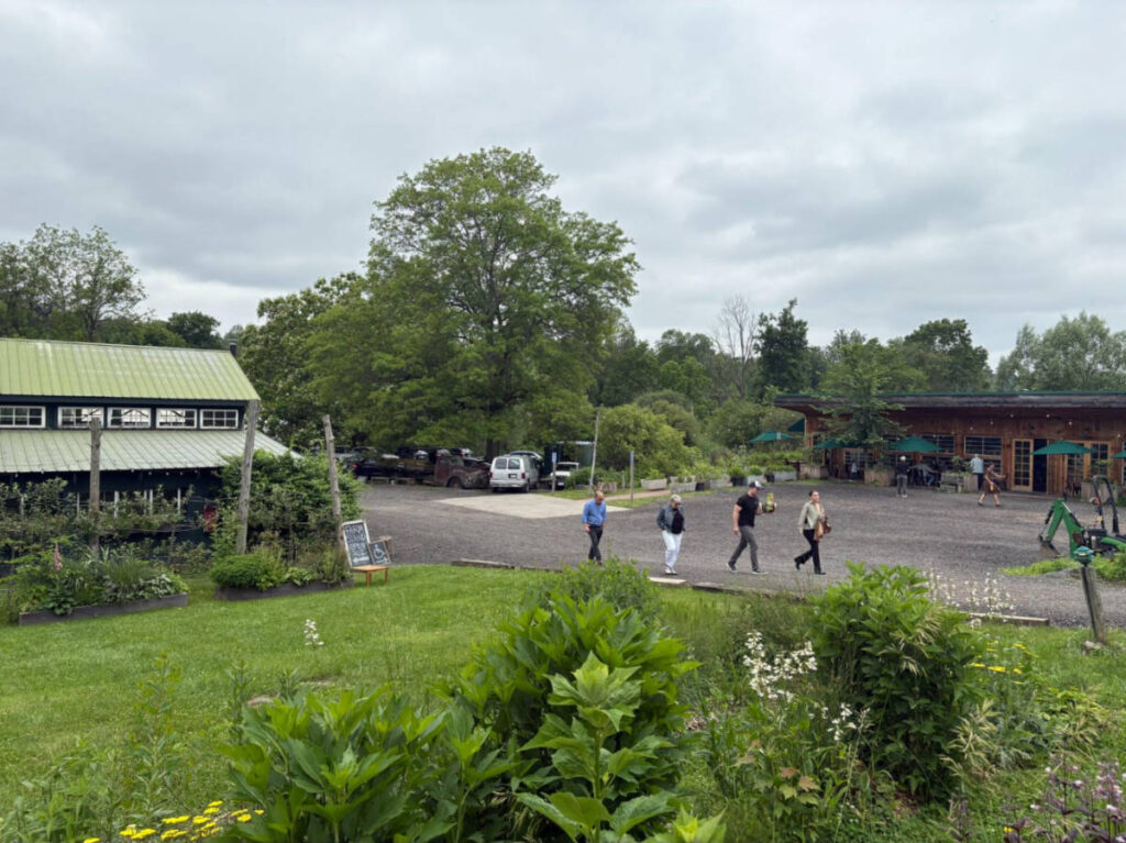 People walking to the entrance to Blooming Hill Farm