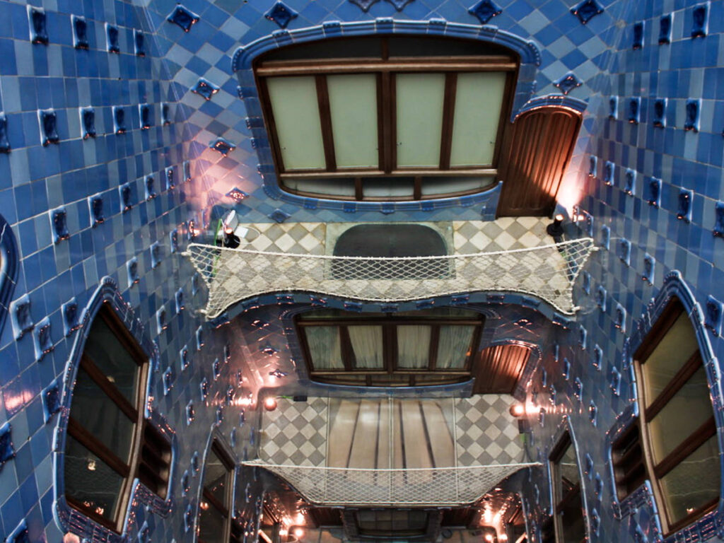 View of the intricate blue tiled walls of Casa Batlló