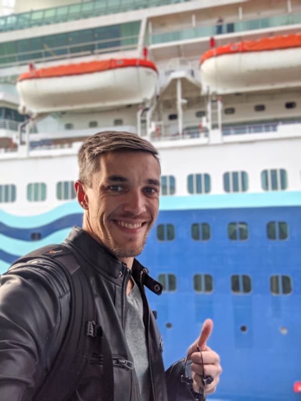 The author Nate giving a thumbs up as he boards the Nomad Cruise