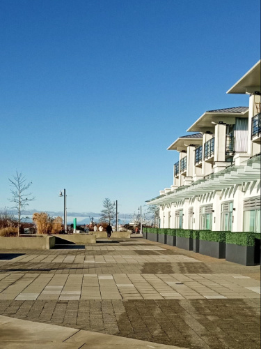 Clear blue sky over the boardwalk at the Steveston Waterfront Hotel