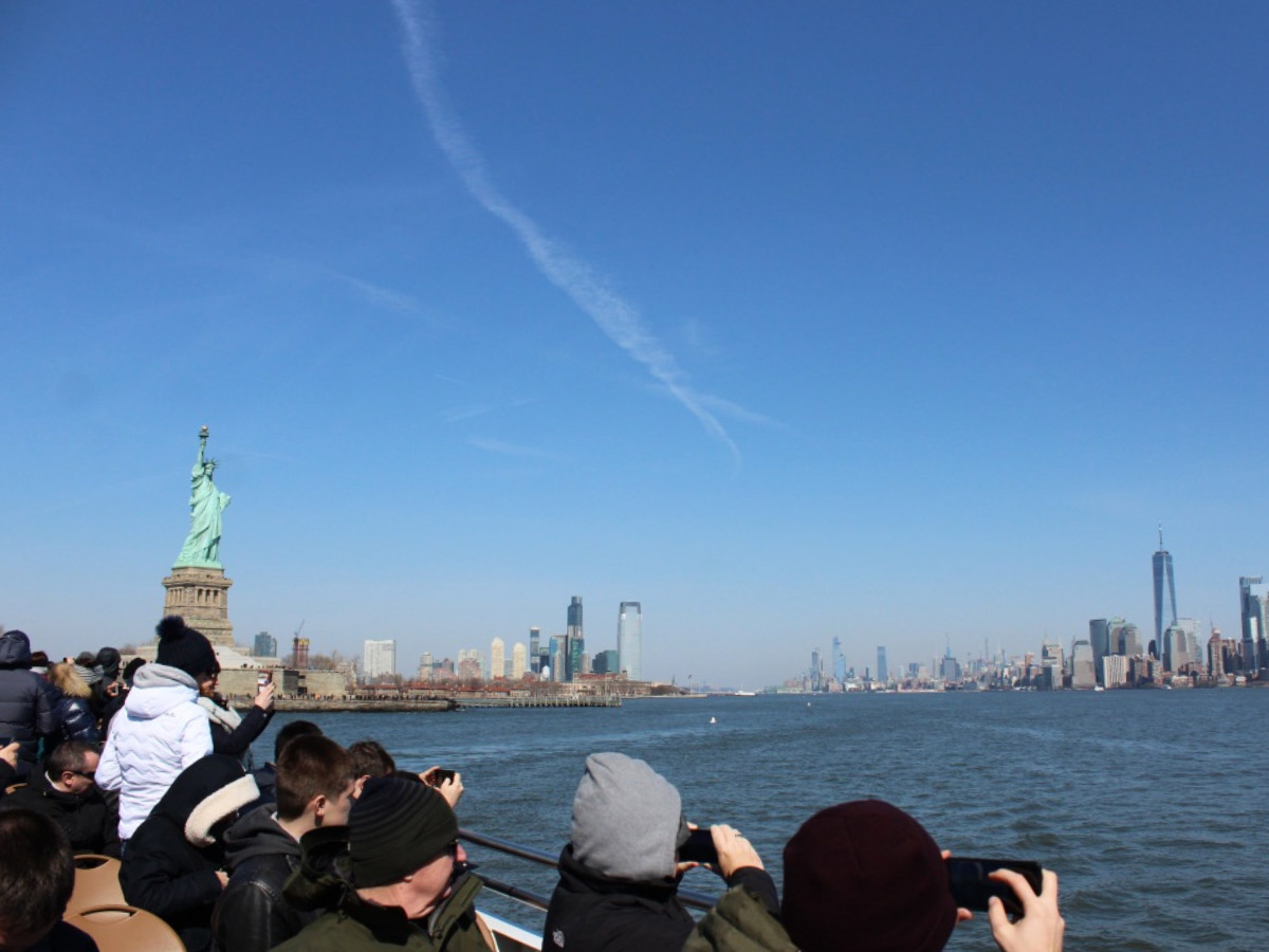 People taking photos during the boat tour on Hudson River