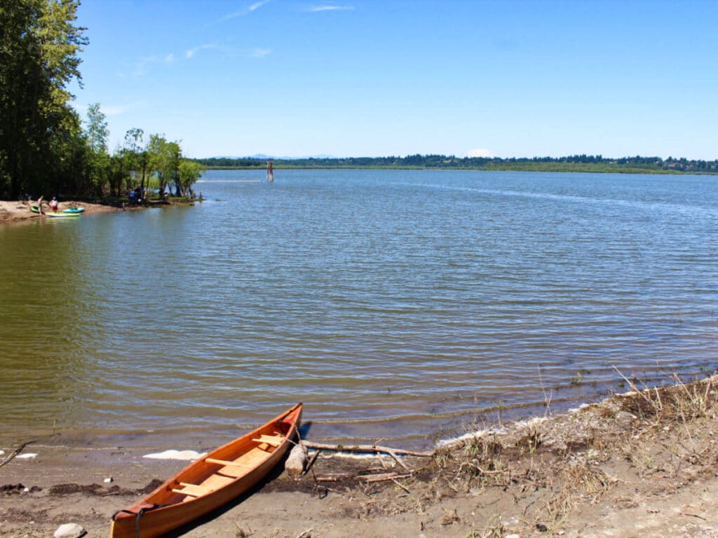 View of the docked boat and the calm waters in Vancouver Lake Park