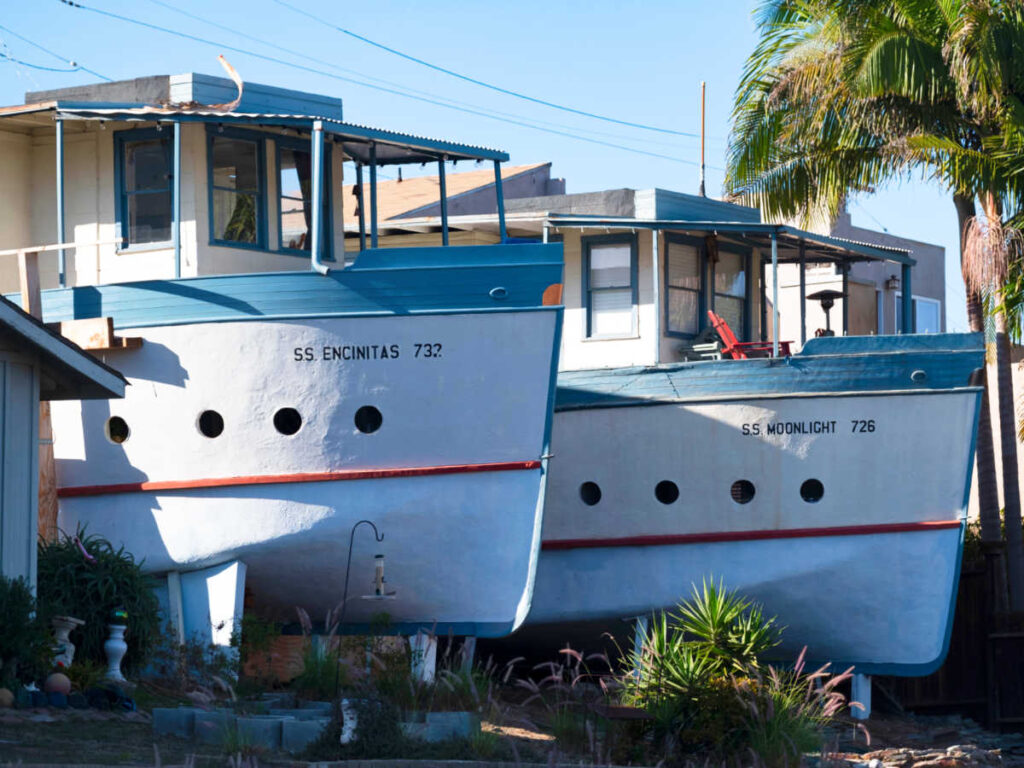 View of the blue and white Encinitas boat houses