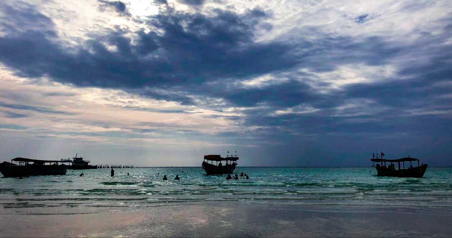 View of boats on the water of the Islands of Cambodia