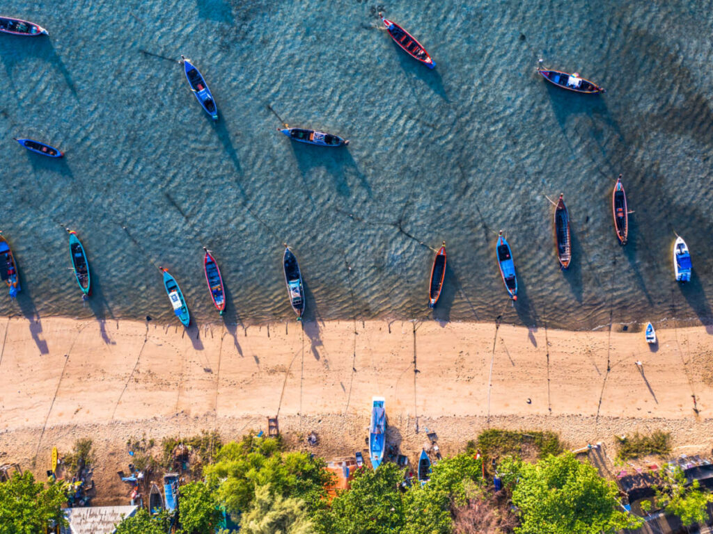 Aerial view of the longtail fishing boats docked on Rawai beach