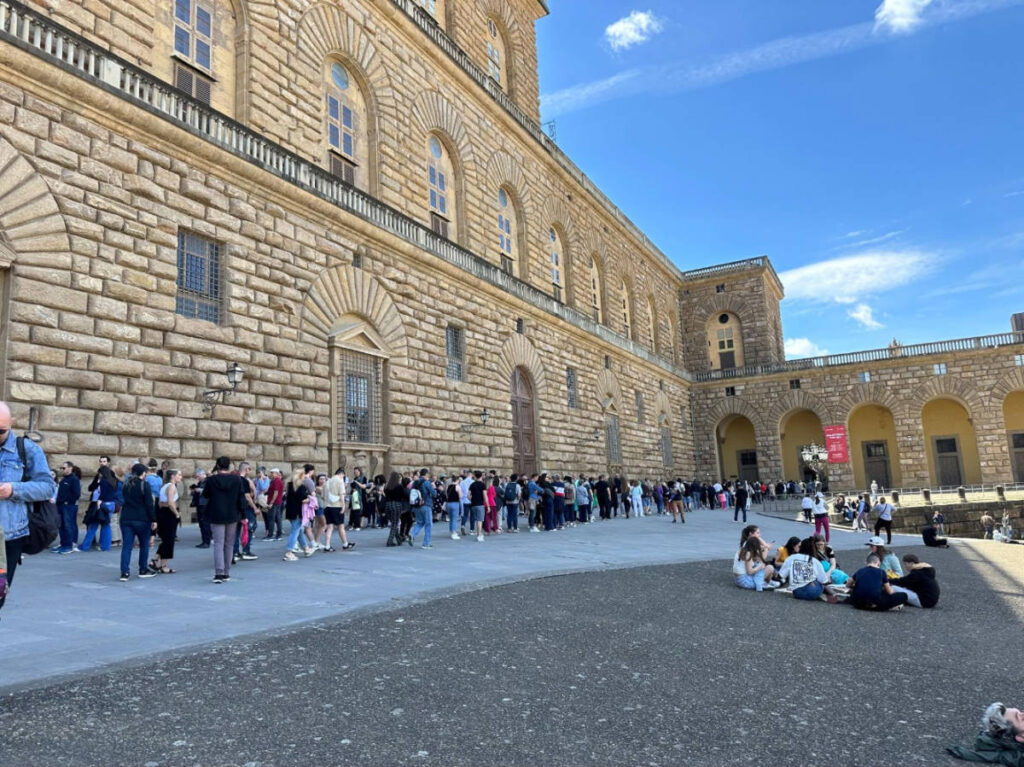 People on a line at the entrance to Boboli Gardens in Florence