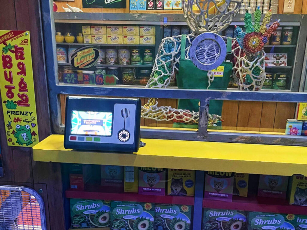 View of a clerk at the Bodega in Meow Wolf