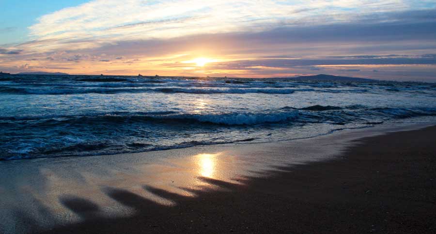 View of the sunset over Bolsa Chica State Beach