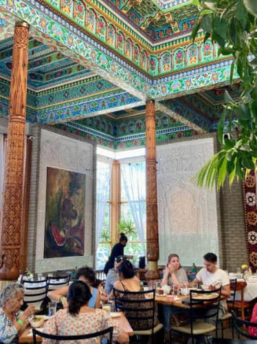 View of people inside the The Boulder Dushanbe Teahouse