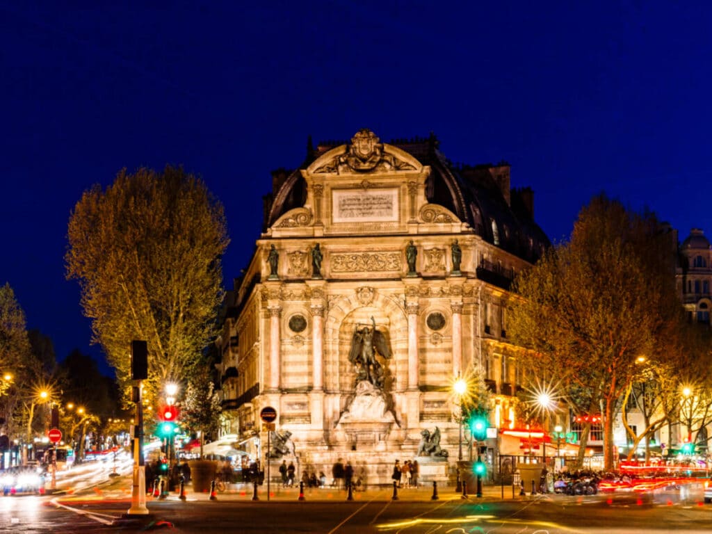 View of the illuminated lights around the busy Boulevard Saint-Michel at night
