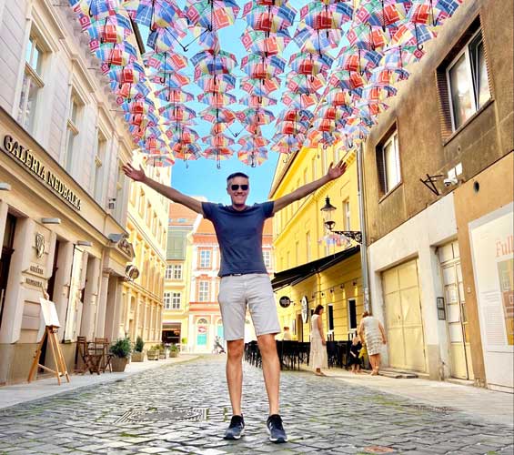 The author posing for a photo in Bratislava, Slovakia