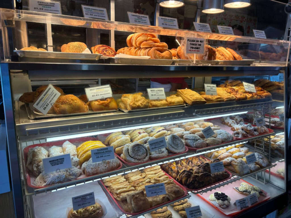 View of the variety of pastries on the display case in Piroshky Piroshky