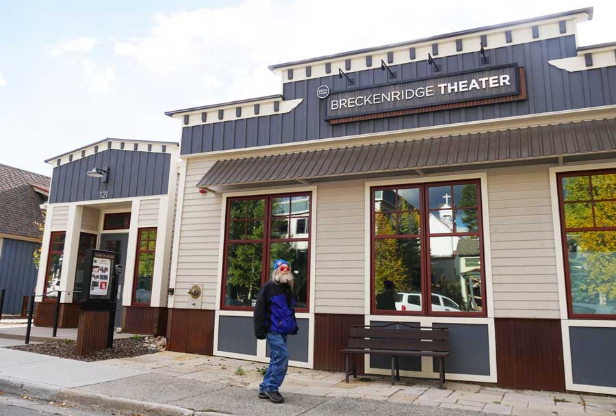 View of a man in front of the Breckenridge Backstage Theatre