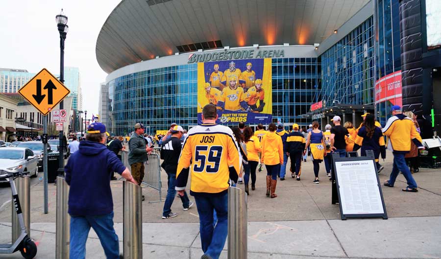 People going inside the Bridgestone Arena for the Predators game