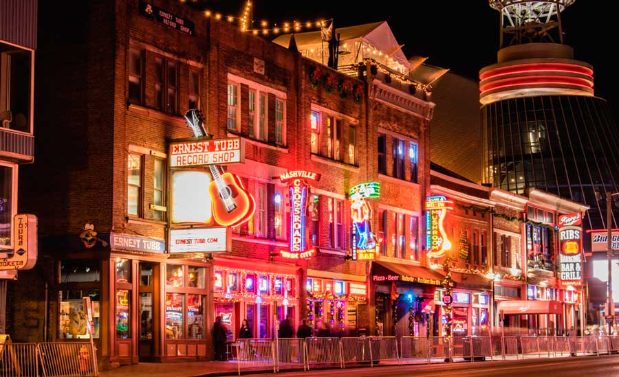 Neon lights sign on the stores at Broadway in Nashville at night