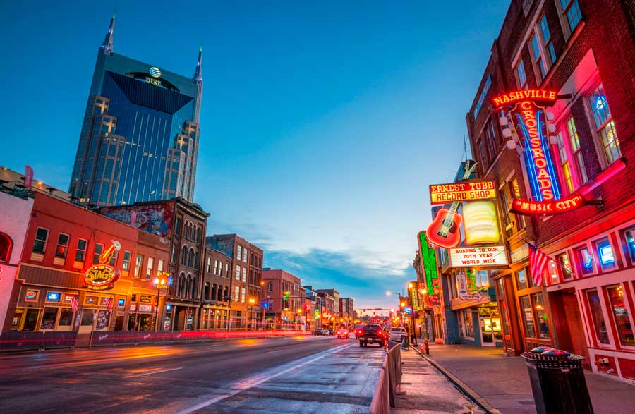 Neon signs at night in Broadway in Nashville