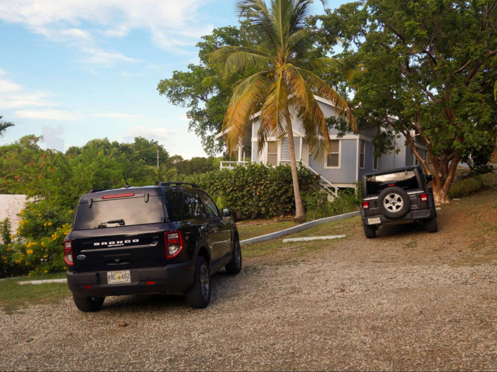 Rented Bronco parked near a house in Culebra